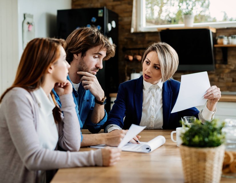 Legal team collaborating around conference table